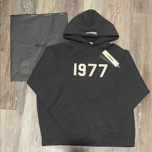 Essentials 1977 iron  Hoodie